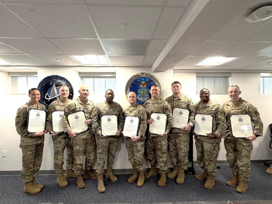 Chief Master Sgts. Karen E. “Liz” Fetherston (left), Air Force Accessions Center Command Chief; Johann Lynch, Headquarters Air Force Enlisted Accessions Policy and Recruiting Career Field Manager; Lucasey Howe, Air Force Recruiting Service Chief Recruiter; Wayne Rutland Jr., AFRS Inspector General Senior Enlisted Leader; Patrick Cone, 372nd Recruiting Group Senior Enlisted Leader; Dwight “Trent” Branstetter, 360th Recruiting Group Senior Enlisted Leader; Ian Kline, Senior Enlisted Leader; Eric Hart, 369th Recruiting Group Senior Enlisted Leader; and Jake Fason, AFRS Command Chief, received the U.S. Air Force Command Master Recruiter Badge on July 29 at Joint Base San Antonio-Randolph. The Command Master Recruiter designation represents the highest benchmark of professional excellence in the recruiting. (U.S. Air Force photo by MSgt Courtney Hott)