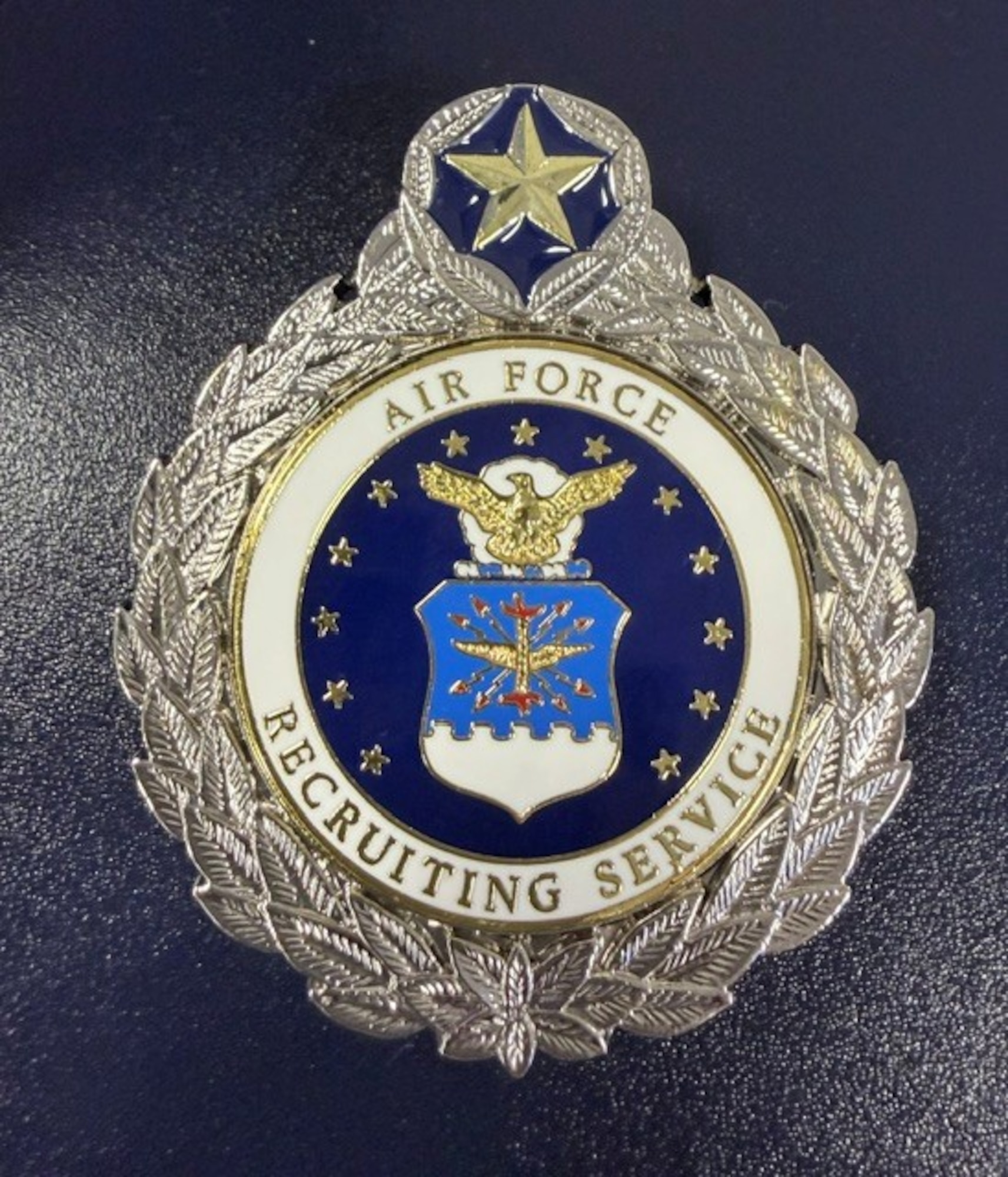 The U.S. Air Force Command Master Recruiter Badge was reinstated June 17, 2026, by Maj. Gen. Jeffrey W. Nelson, Commander of the Air Force Accessions Center. The reinstatement restores a distinction that recognizes technical proficiency, strategic leadership and service at the highest level of the Air Force Recruiting Service career field. (U.S. Air Force photo by Olivia Mendoza Sencalar)