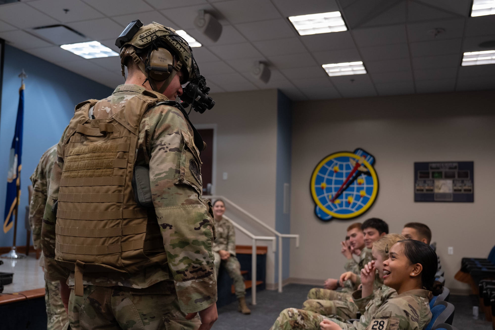 Oliver Lambert, a U.S. Air Force Academy cadet, tries on tactical gear during an Operations Air Force immersion at Hurlburt Field