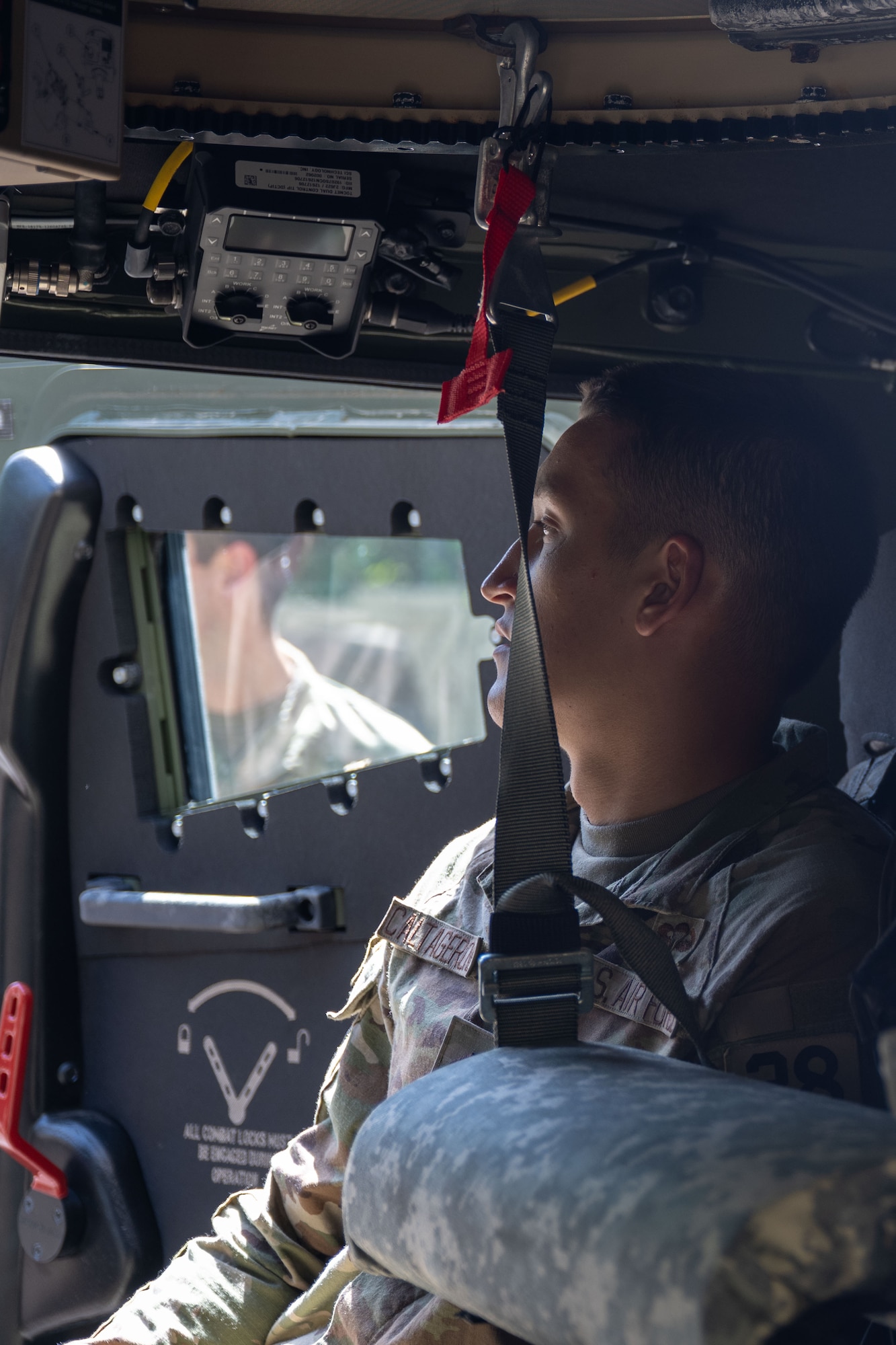 a U.S. Air Force Academy cadet, sits inside a Joint Light Tactical Vehicle during an immersion at Hurlburt Field