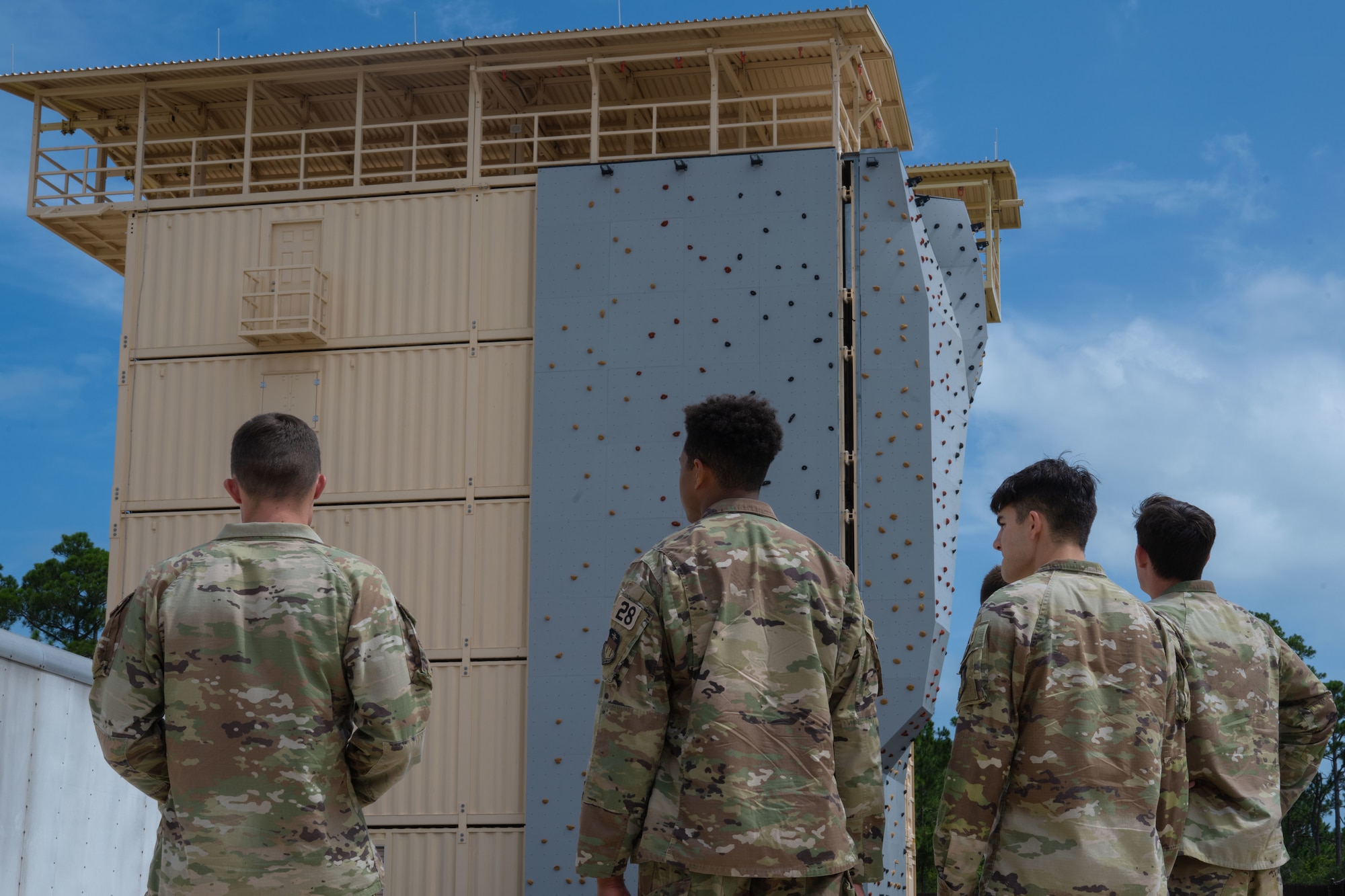 U.S. Air Force Academy cadets receive a briefing at a training tower during an immersion at Hurlburt Field