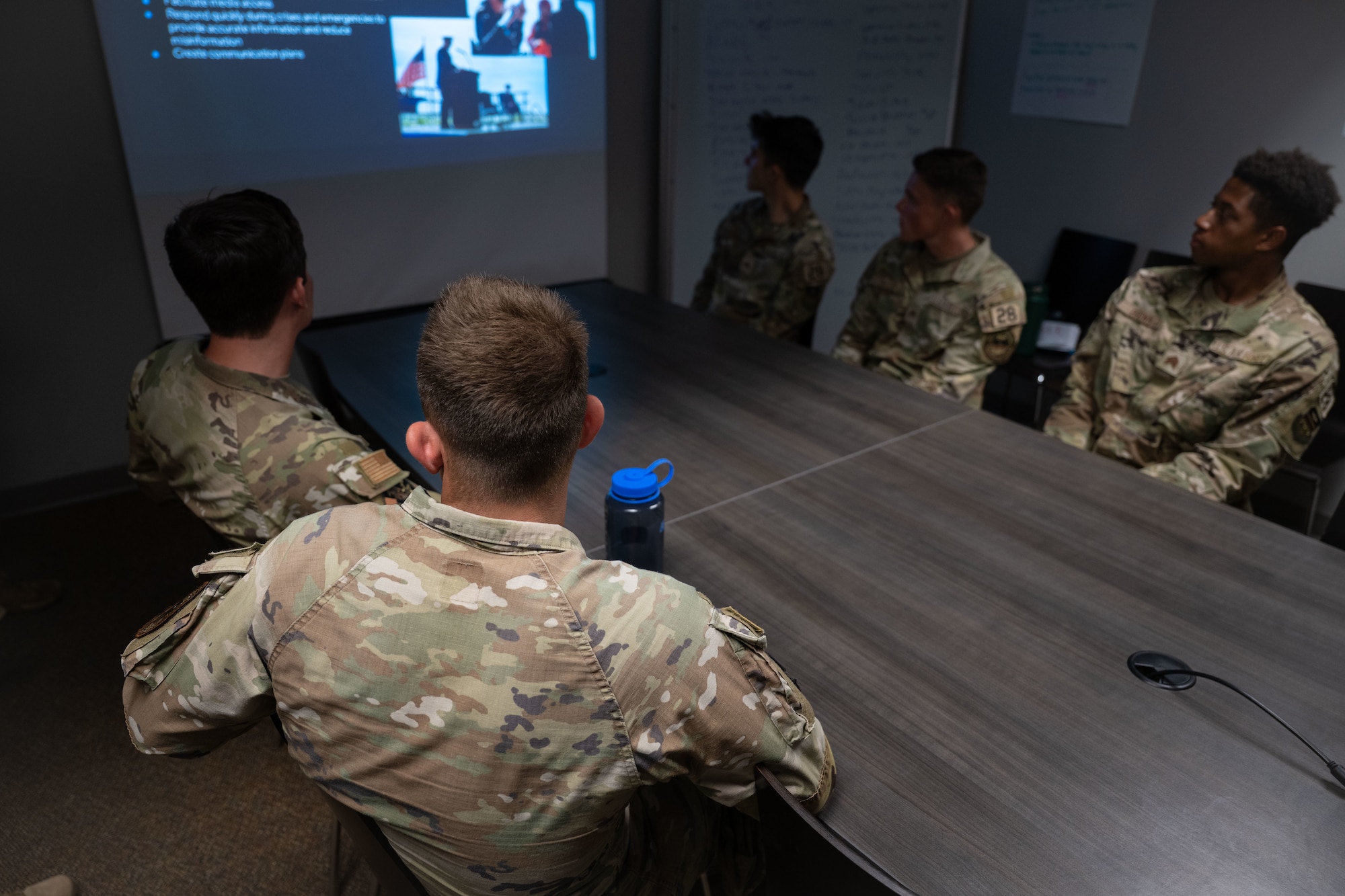U.S. Air Force Academy cadets listen to a presentation about 1st Special Operations Wing public affairs functions during an immersion at Hurlburt Field