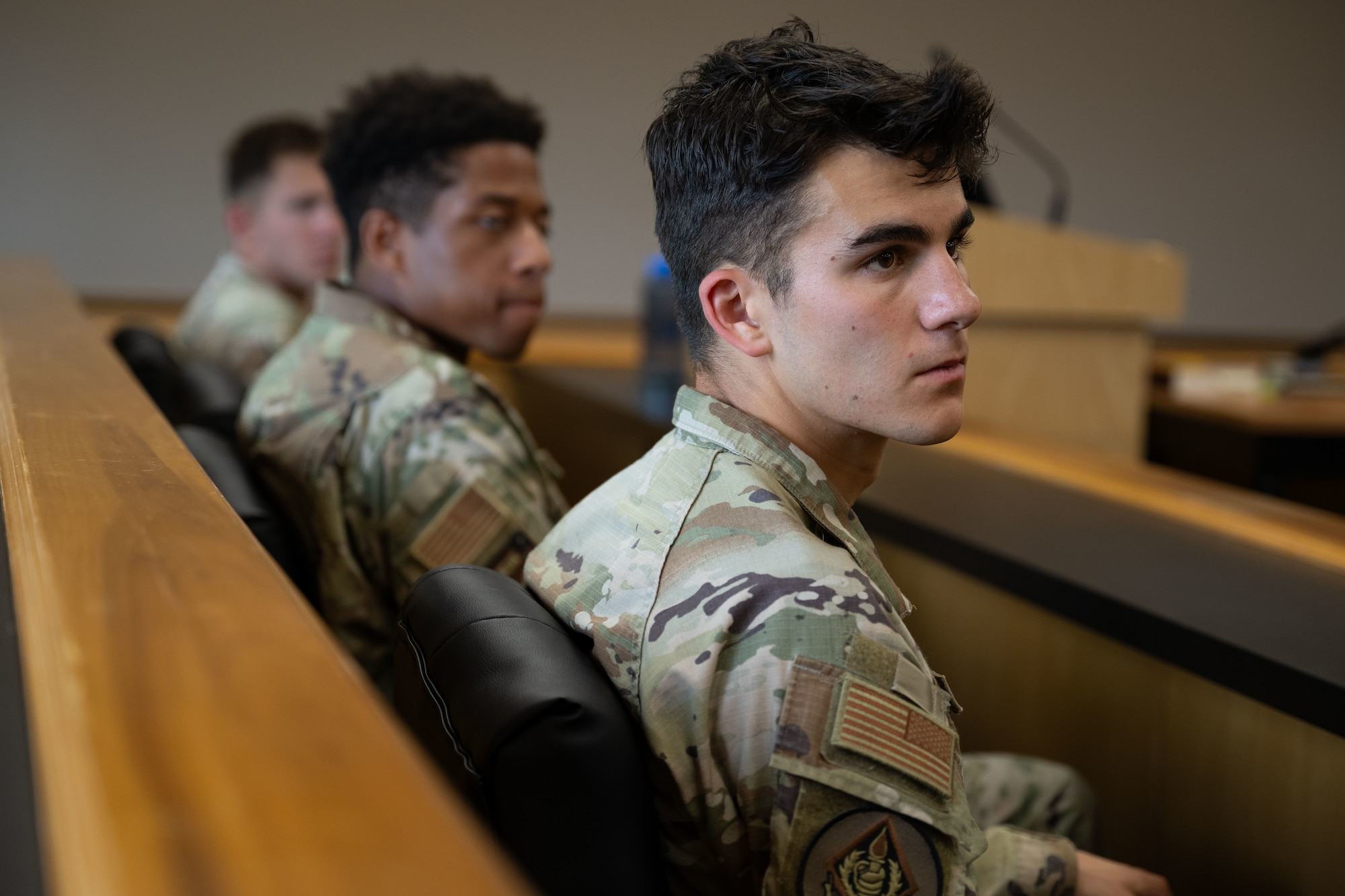 U.S. Air Force Academy cadets receive a briefing from a Judge Advocate assigned to the 1st Special Operations Wing during an immersion at Hurlburt Field