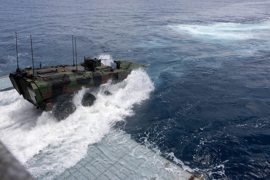 A U.S. Marines Corps Amphibious Combat Vehicle assigned with 3rd Assault Amphibian Battalion, 1st Marine Division debarks off the well deck of Whidbey Island class amphibious dock landing ship USS Ashland (LSD 48) during Quarterly Underway Amphibious Readiness Training 26.4, off the coast of California, July 26, 2026. QUART is a joint training exercise that strengthens amphibious readiness through realistic maritime training, sharpening the warfighting skills of Marines and Sailors to prepare them for crises and to fight west of the International Date Line.   (U.S. Marine Corps photo by Lance Cpl. Ronnie Mejia)