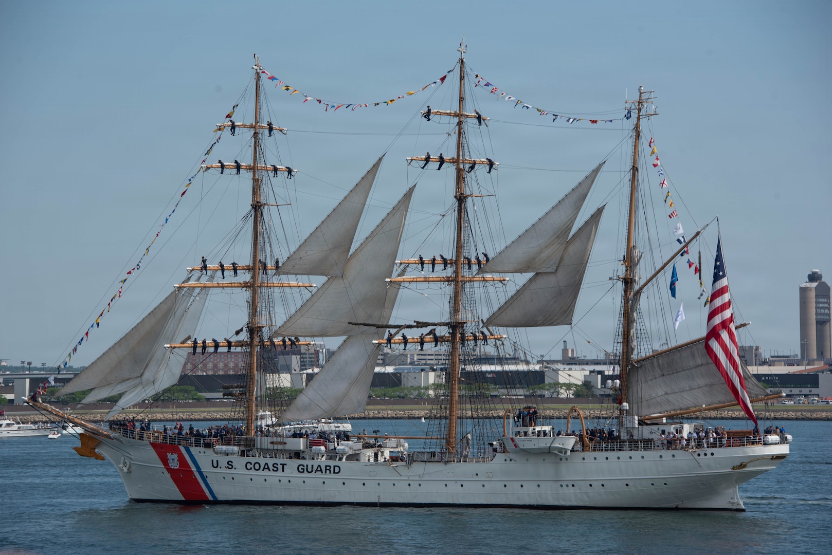 The U.S. Coast Guard Cutter Eagle transits Boston Harbor during the Sail 250 Parade of Sail in Boston, July 11, 2026. Known as America’s Tall Ship, Eagle participated in the international gathering honoring the nation’s maritime heritage and 250 years of American independence. (U.S. Coast Guard photo by Petty Officer 3rd Class Lyric Jackson)