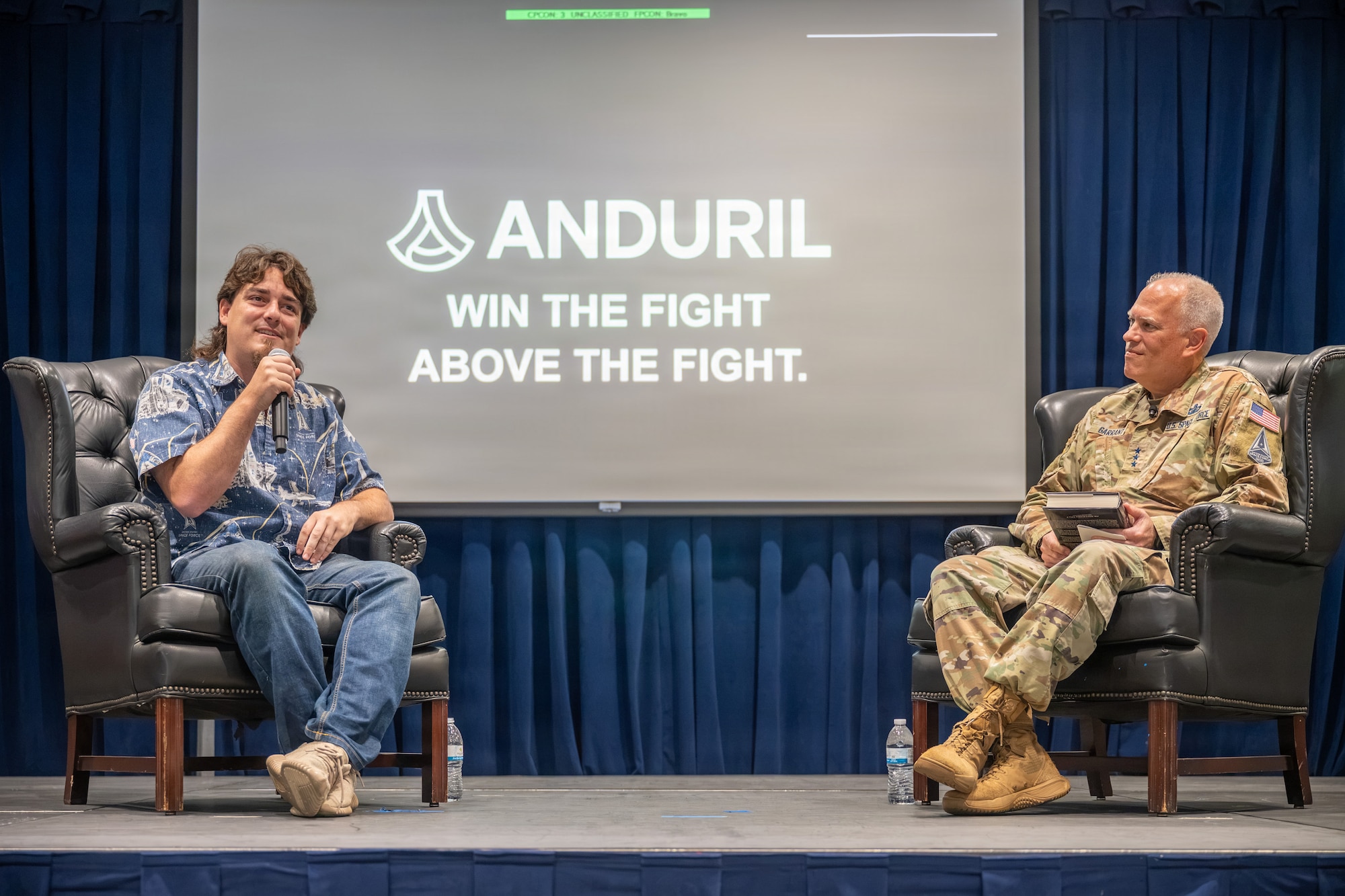 U.S. Space Force Lt. Gen. Philip Garrant, commander of Space Systems Command (SSC), right, speaks with Palmer Luckey, founder of Anduril Industries, during a “Guardians Everywhere” event at Los Angeles Air Force Base in El Segundo, California, August 6, 2026. Guardians, Airmen, civilians and contractors joined the discussion which focused on innovation, leadership mindset and the role of emerging technologies in strengthening national security and space domain awareness. (U.S. Space Force photo by Christopher Kim)