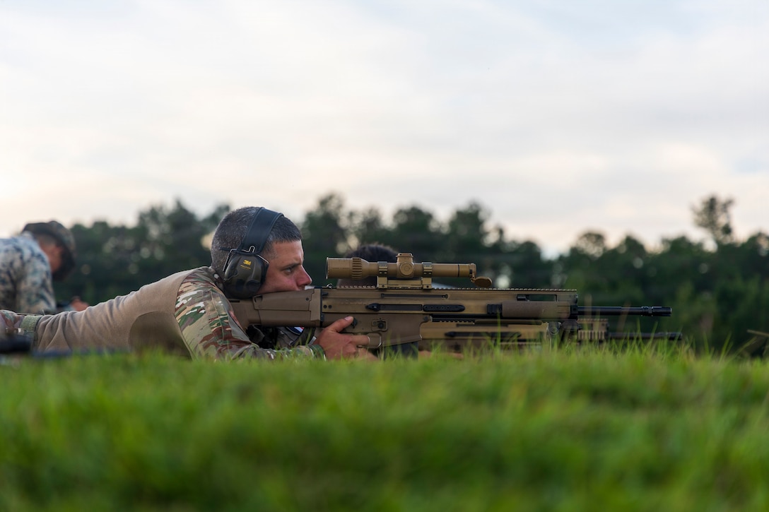 A French marine fires an FN SCAR H-PR sniper rifle while conducting a live-fire range during Fleet Exercise 250 (FLEETEX) on Marine Corps Base Camp Lejeune, North Carolina, June 20, 2026. FLEETEX 250 represents the United States’ commitment to layer defense of the homeland through forward-deployed forces and reinforces interoperability with allies and partners through collective maritime security. (U.S. Marine Corps photo by Cpl. Matthew Williams)