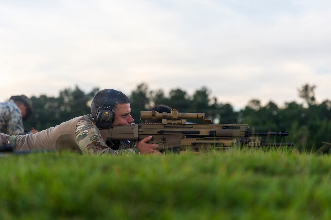 A French marine fires an FN SCAR H-PR sniper rifle while conducting a live-fire range during Fleet Exercise 250 (FLEETEX) on Marine Corps Base Camp Lejeune, North Carolina, June 20, 2026. FLEETEX 250 represents the United States’ commitment to layer defense of the homeland through forward-deployed forces and reinforces interoperability with allies and partners through collective maritime security. (U.S. Marine Corps photo by Cpl. Matthew Williams)