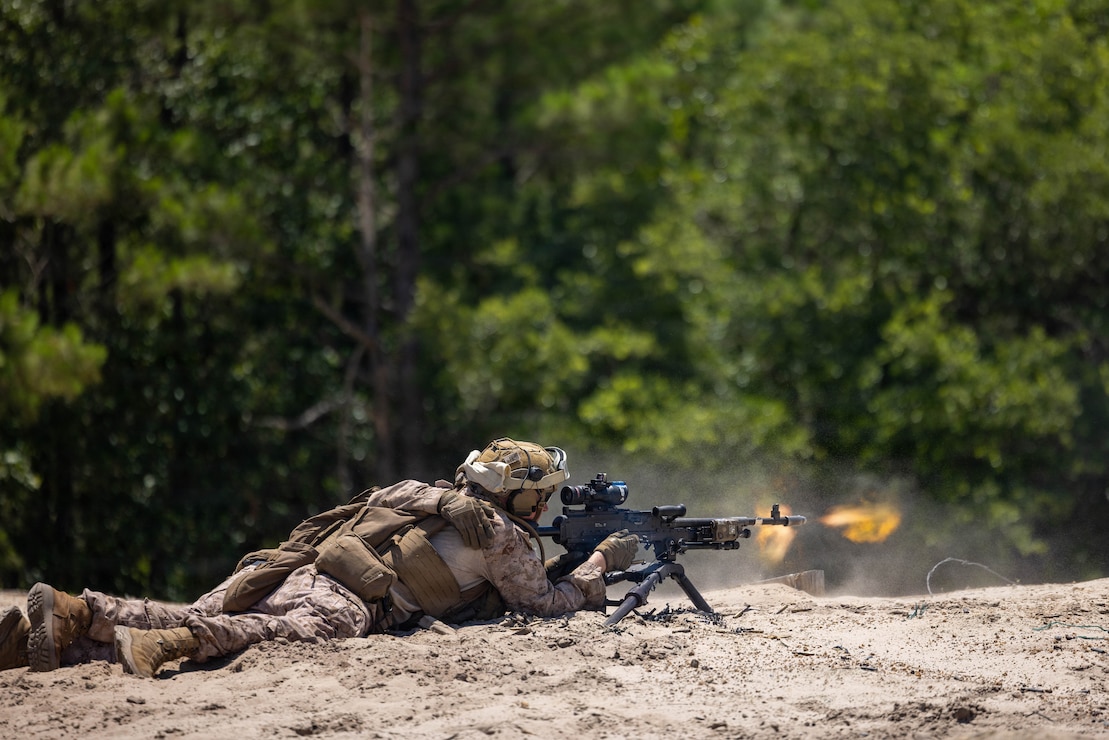 U.S. Marine Corps Lance Cpl. Zachary Shives, a combat engineer with 2nd Combat Engineer Battalion, 2nd Marine Division, fires an M240B medium machine gun during a multinational assault breach training as a part of Fleet Exercise 250 (FLEETEX) on Marine Corps Base Camp Lejeune, North Carolina, June 21, 2026. FLEETEX 250 represents the United States’ commitment to layer defense of the homeland through forward-deployed forces and reinforces interoperability with allies and partners through collective maritime security. (U.S. Marine Corps photo by Cpl. Channah Chilton)