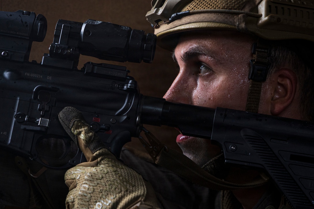 A Spanish marine aims down sights while conducting an amphibious assault during Fleet Exercise 250, on Marine Corps Base Camp Lejeune, North Carolina, June 27, 2026. FLEETEX 250 represents the United States’ commitment to layer defense of the homeland through forward-deployed forces and reinforces interoperability with allies and partners through collective maritime security. (U.S. Marine Corps photo by Cpl. Matthew Williams)