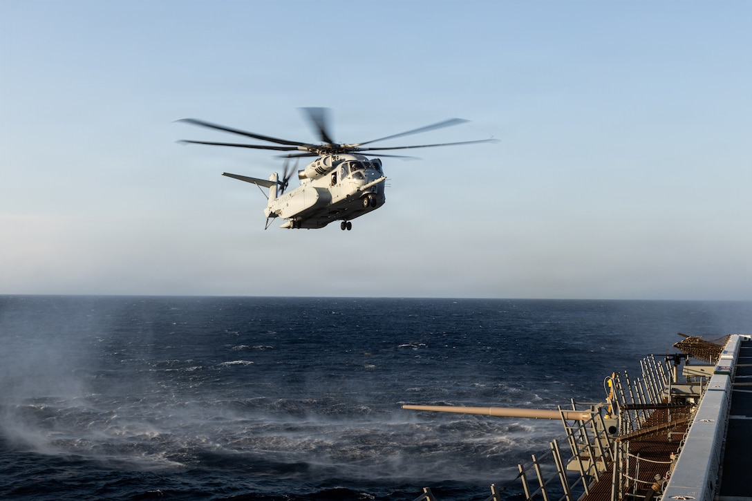 A U.S. Marine Corps CH-53K King Stallion with Marine Heavy Helicopter Squadron (HMH) 461 takes flight from the San Antonio-class amphibious transport dock ship USS Arlington (LPD 24) during the Type Commander’s Amphibious Training off the coast of North Carolina, June 11, 2026. TCAT is a military exercise designed to enhance mobility and integration between the U.S. Marine Corps and the U.S. Navy. The amphibious force is an integrated powerhouse providing sea, land, and air operations, giving geographic combatant commanders a more flexible, agile force for aggregated or dis-aggregated operations across the globe. (U.S. Marine Corps photo by Cpl. Osmar VasquezHernandez)