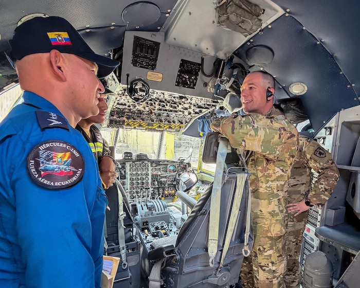 Lt. Col. Tim Ori, right, officer in charge of a 123rd Medical Group Critical Care Air Transport Team, meets with members of the Ecuadorian Air Force during a five-day information exchange in Ecuador. The Kentucky Air National Guard has been partnered with Ecuador since 1996 and helped stand up C-130 Hercules operations there when Ecuador acquired H-model aircraft in 2024. (Courtesy photo)
