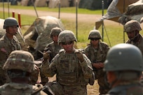 Maj. Gen. Kelly Dickerson, Commanding General, 84th Training Command, Army Reserve conducts a battlefield circulation to check on training and the welfare of Soldiers, August 5, 2026, at Fort McCoy, Wis. Medical units participating in the Regional Medic exercise establish treatment facilities, conduct casualty triage, provide emergency medical care, coordinate medical evacuation, and practice prolonged field care under simulated combat conditions. (U.S. Army Reserve photo by Sgt. 1st Class Justin Hardin)