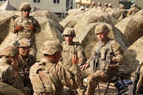 Army Reserve Commanding General Kelly Dickerson 84th Training Command, conducts a battlefield circulation to check on training and the welfare of Soldiers, August 5, 2026, at Fort McCoy, Wis. Medical units participating in the Regional Medic exercise establish treatment facilities, conduct casualty triage, provide emergency medical care, coordinate medical evacuation, and practice prolonged field care under simulated combat conditions. (U.S. Army Reserve photo by Sgt. 1st Class Justin Hardin)