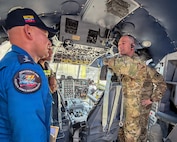 Lt. Col. Tim Ori, right, officer in charge of a Kentucky National Guard 123rd Medical Group Critical Care Air Transport Team, meets with members of the Ecuadorian Air Force during a five-day information exchange in Ecuador.