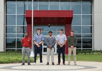 Left to right: Ian Anzigare, University of Alabama in Huntsville civil engineering student, Christian Jarrett, Auburn University mechanical engineering student, Kevin Peet, University of Alabama mechanical engineering student, Caden Bailes, Auburn University electrical engineering student, and Wyatt Donaldson, Auburn University civil engineering student.