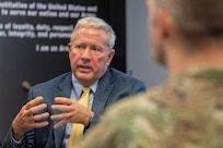 U.S. Army Timothy Riggs, U.S. Army Financial Management Command System Support Operations organizational readiness chief, left, answers questions about U.S. Army enterprise resource planning systems for Republic of Korea Army finance officers at the Maj. Gen. Emmett J. Bean Federal Center in Indianapolis July 9, 2026. The ROKA finance officers visited USAFMCOM after a trip to the Office of the Assistant Secretary of the Army for Financial Management and Comptroller at the Pentagon and before heading to the U.S. Army Finance and Comptroller School at Fort Jackson, S.C., where they learned about the structure and operations of the U.S. Army Finance Corps. (U.S. Army photo by Mark R. W. Orders-Woempner)