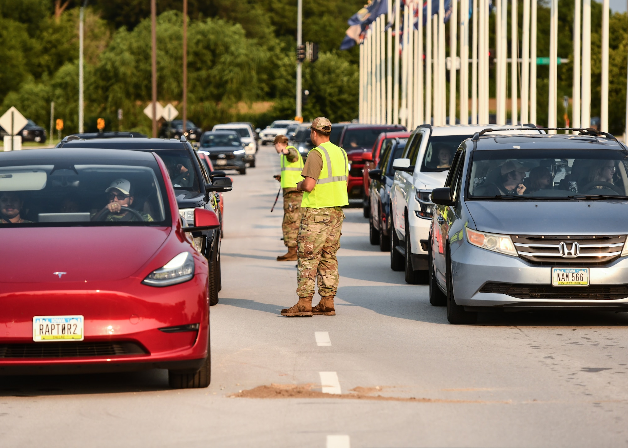 Defenders and augmentees of the 55th Security Forces Squadron check IDs and vehicle passes for the 2026 Defenders of Freedom Air and Space show on Offutt Air Force Base, August 8, 2026. Defenders of Freedom Air and Space Show 2026 was designed to educate the public on the strategic importance of Offutt AFB and the many worldwide missions it supports, providing a firsthand look at the advanced aircraft and highly trained personnel required to execute operations globally. (U.S. Air Force photo by Chad Watkins)