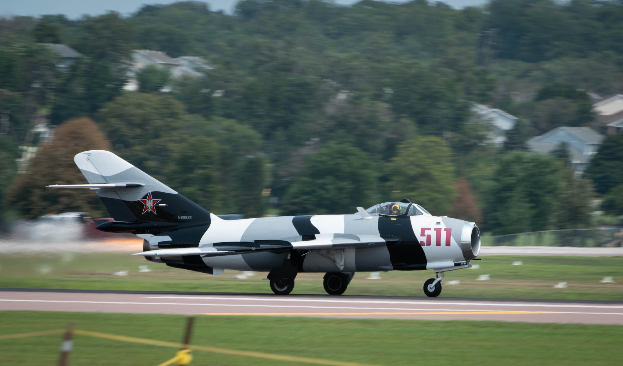 A MiG-17F prepares to ascend on the flightline during the 2026 Defenders of Freedom Air & Space Show at Offutt Air Force Base, Nebraska, Aug. 9, 2026. Defenders of Freedom Air & Space Show 2026 was designed to educate the public on the strategic importance of Offutt AFB and the many worldwide missions it supports, providing a firsthand look at the advanced aircraft and highly trained personnel required to execute operations globally. (U.S. Air Force photo by Daniel Martinez)