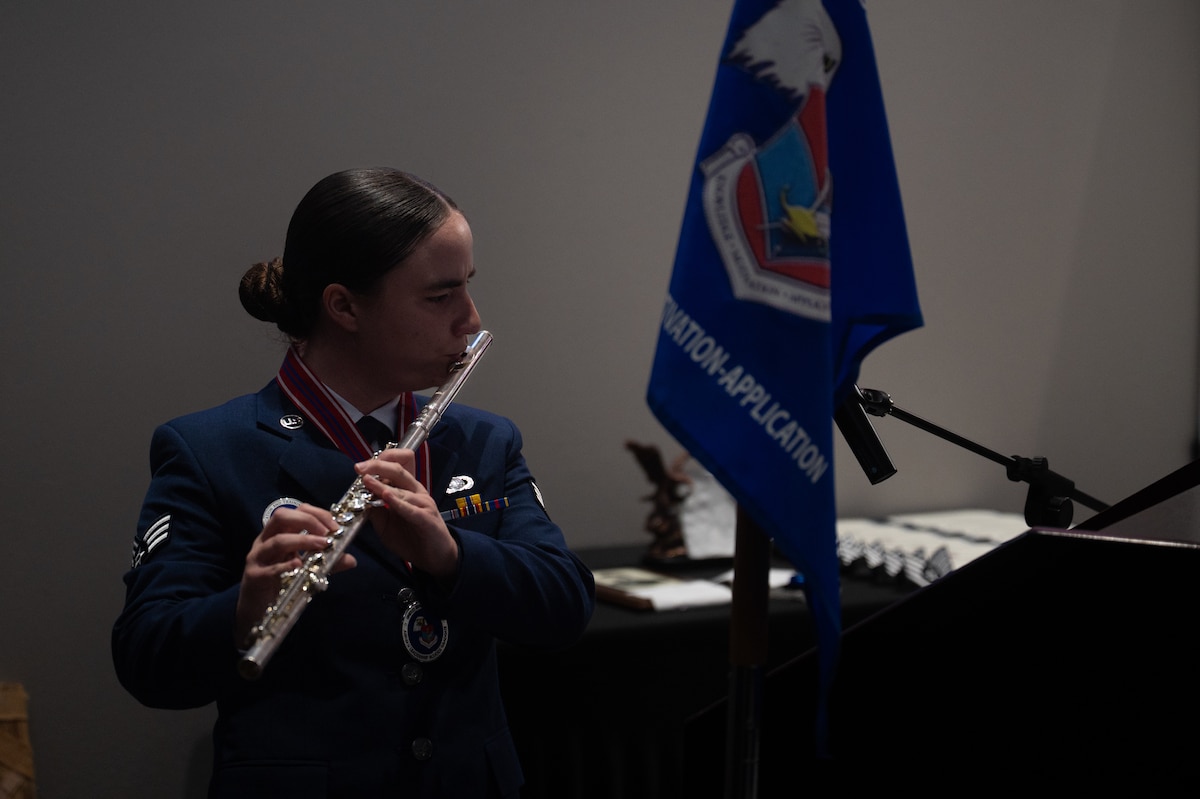 U.S. Air Force Senior Airman Savannah Osborn, 316th Training Squadron instructor, plays the national anthem during an Airmen Leadership School graduation at Goodfellow Air Force Base, Texas, Aug. 6, 2026. ALS is a five-week entry level leadership enhancement course designed to prepare Airmen for positions of greater responsibility by strengthening their ability to lead, follow and manage while also gaining a broader understanding of the military profession and their role within the Air Force. (U.S. Air Force photo by Senior Airman Brian Lummus)