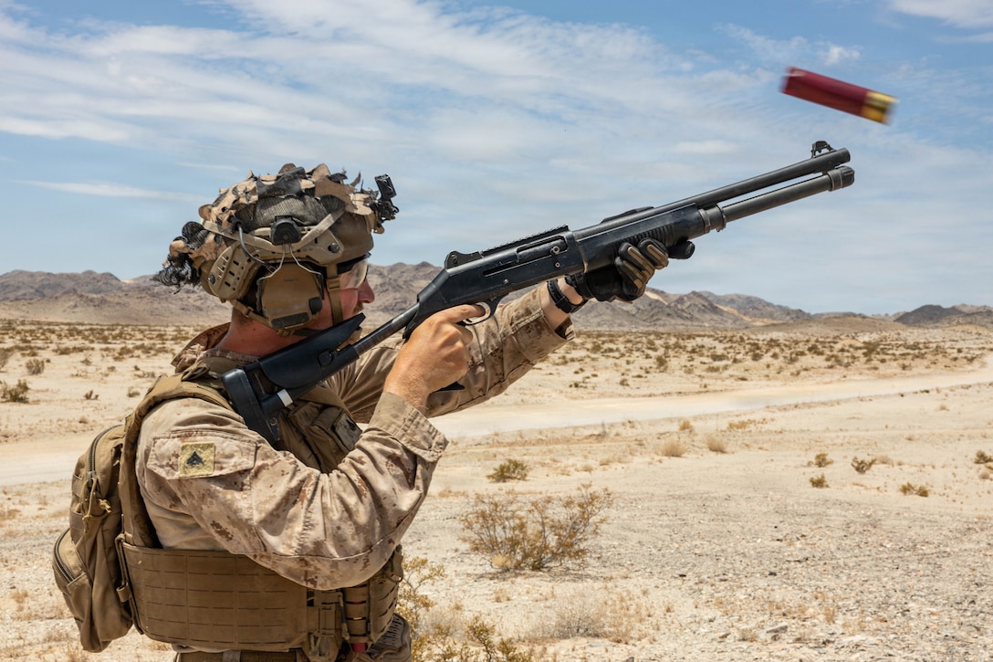 U.S. Marine Corps Cpl. Ethan Camarco, a South Carolina native and team leader with 1st Combat Engineer Battalion, 1st Marine Division, fires a M1014 shotgun during Counter-small Unmanned Aerial System training as part of Service Level Training Exercise 4-26 at Training Area Prospect, Marine Corps Air Ground Combat Center, Twentynine Palms, California, July 17, 2026. With the debut of C-sUAS lanes at the Combat Center, Marines recognize and respond to unmanned aerial threats by employing emerging tactics, techniques, procedures, and maintaining a C-sUAS mindset in every operation, all while preserving the fundamentals that make rifle squads survivable and lethal. SLTE is a premier training event that ensures the Marine Corps remains a highly lethal, adaptable force capable of dominating the future multi-domain fight. (U.S. Marine Corps photo by Lance Cpl. Cody Fitzgerald)