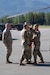 Alaska Army National Guard Col. David Kang assumes command of the 38th Troop Command from Col. Anthony Mortrud during a change-of-command ceremony at Bryant Army Airfield on Joint Base Elmendorf-Richardson, Alaska, Aug. 1, 2026. Col. Aaron Kelsey, the Alaska Army National Guard land component commander, presided over the ceremony. (Alaska Army National Guard photo by Spc. Jeffrey Morton)