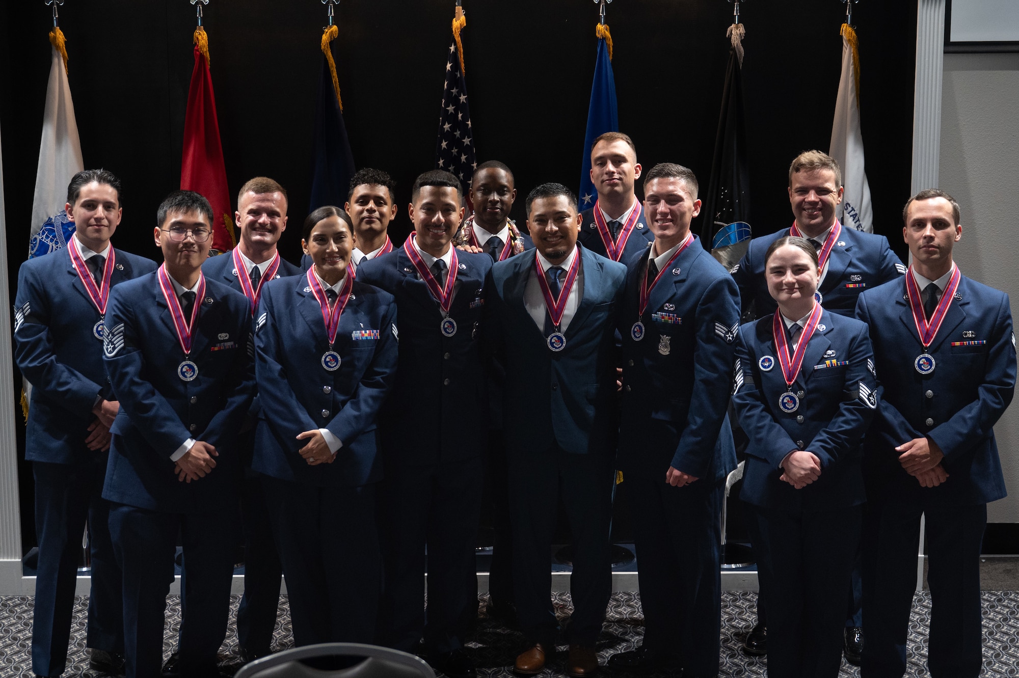 Airman Leadership School Class 26-E pose for a group photo after an ALS graduation at Goodfellow Air Force Base, Texas, Aug. 6, 2026. ALS provides Airmen and Guardians with a deeper understanding of their role as military supervisors and the impact they have on accomplishing the Air Force mission. (U.S. Air Force photo by Senior Airman Brian Lummus)