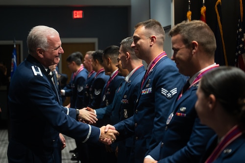 U.S. Air Force Col. Matthew Norton, 17th Training Wing commander, shakes hands with Senior Airman Brayden Garner, 47th Contracting Squadron contracting specialist, after an ALS graduation at Goodfellow Air Force Base, Texas, Aug. 6, 2026. ALS graduation ceremonies are held to give leadership, family, friends and coworkers the opportunity to celebrate with and congratulate the graduates on one of the most important milestones in their Air Force career. (U.S. Air Force photo by Senior Airman Brian Lummus)