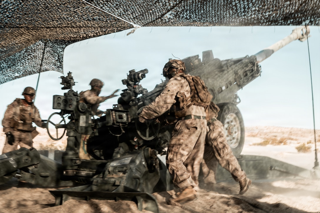 U.S. Marines with 3rd Battalion, 11th Marines Regiment, 1st Marine Division,  fire an M777 Howitzer during an observation shoot as part of Service Level Training Exercise 4-26 at Marine Corps Air Ground Combat Center, Twentynine Palms, California, July 29, 2026. SLTE is a premier training event that ensures the Marine Corps remains a highly lethal, adaptable force capable of dominating the future multi-domain fight. (U.S. Marine Corps photo by Lance Cpl. Dominic Spence)