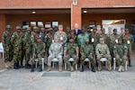 U.S. and Botswana military personnel pose for a photo following the opening ceremony for Exercise Southern Accord 2026 at Gaborone Technical College in Gaborone, Botswana, Aug. 10, 2026. The biennial exercise, running Aug. 10-15, 2026, supports U.S. Africa Command’s objectives of empowering willing and able African partners to lead efforts to degrade and disrupt illicit activities and malign actors in the region. Photo by Staff Sgt. Reanna Hartgrove.