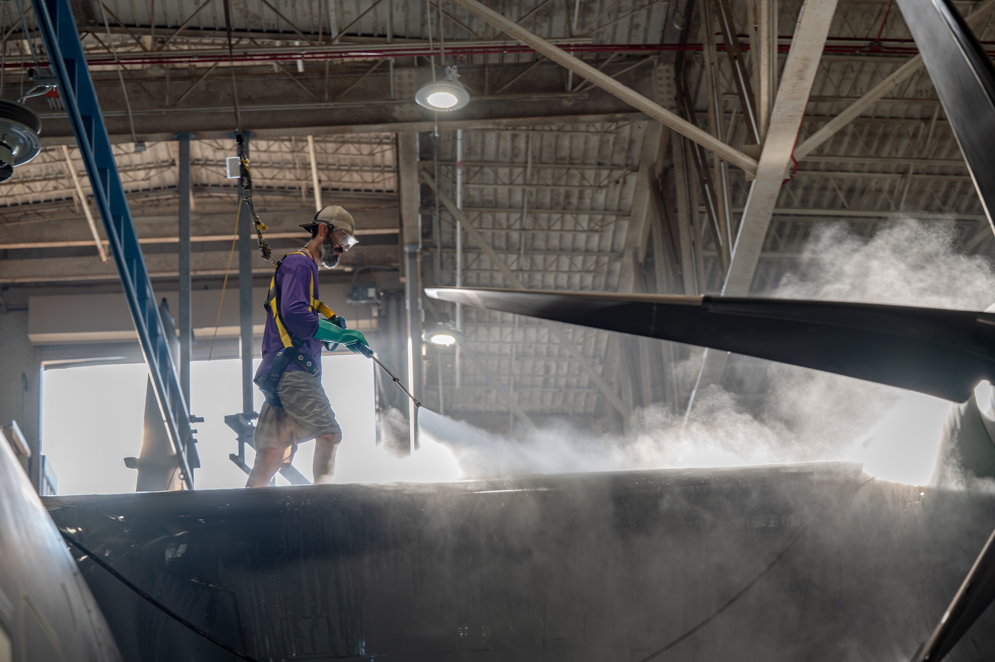 A Hurlburt Field wash rack contractor pressure washes an MC-130J Commando II assigned to the 1st Special Operations Wing at Hurlburt Field, Florida, July 2, 2026.