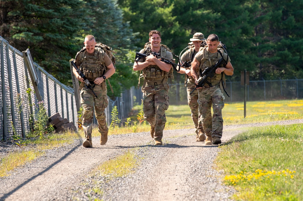 Competitors begin the first portion of the 9-mile ruck march during the 101st Air Refueling Wing Security Forces Squadron Best Defender competition, Bangor, Maine, July 28, 2026.