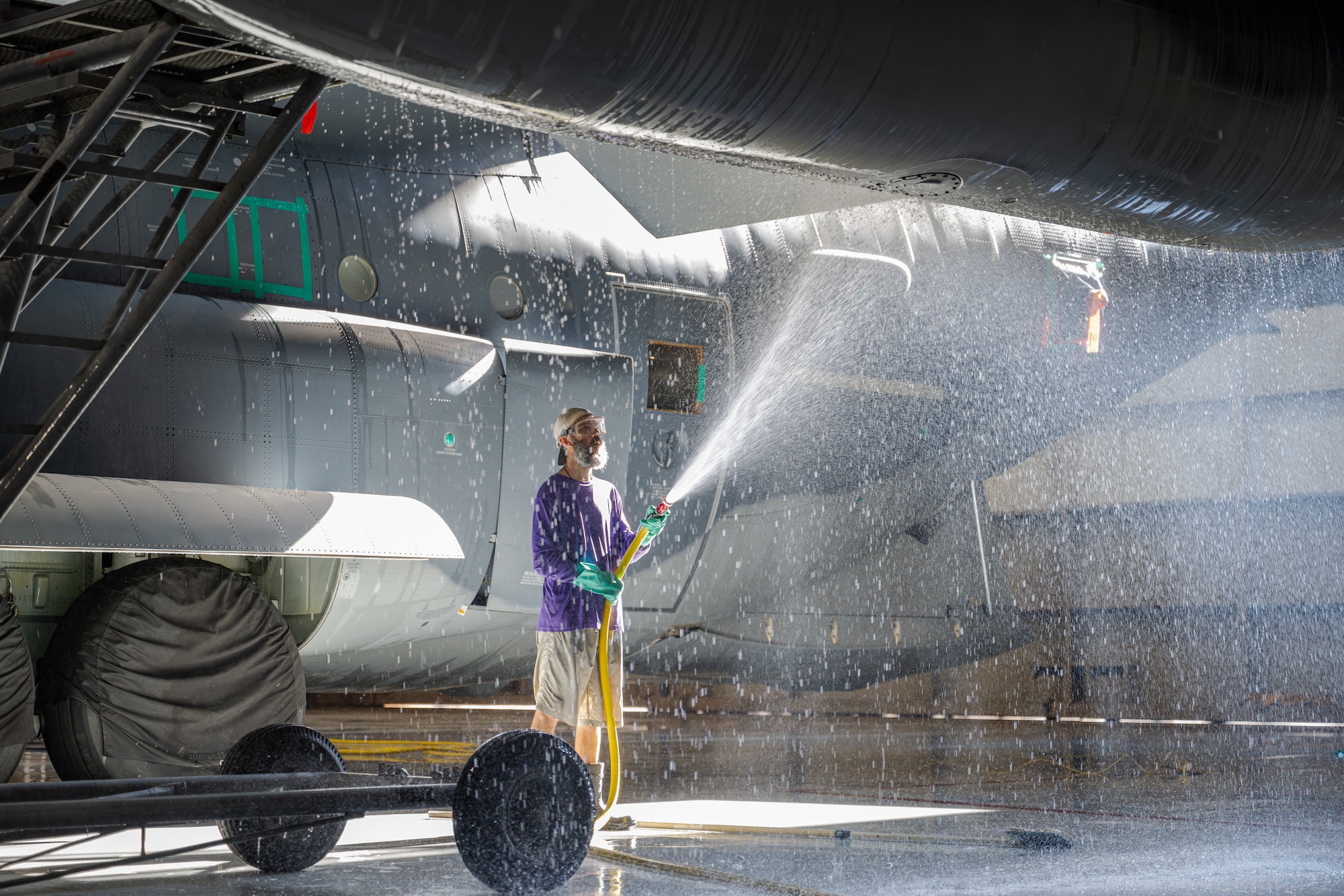 A Hurlburt Field wash rack contractor rinses an MC-130J Commando II assigned to the 1st Special Operations Wing at Hurlburt Field, Florida, July 2, 2026.
