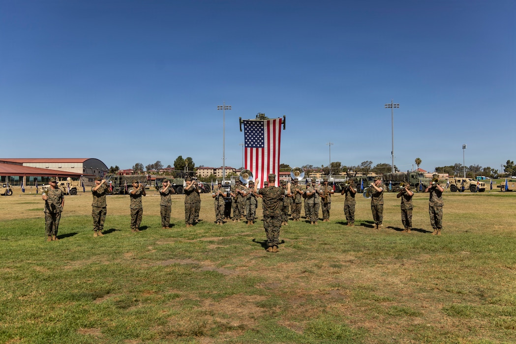 U.S. Marines with the 1st Marine Division Band play music during a change of command ceremony for Combat Logistics Regiment 1, 1st Marine Logistics Group on Marine Corps Base Camp Pendleton, California, July 23, 2026.