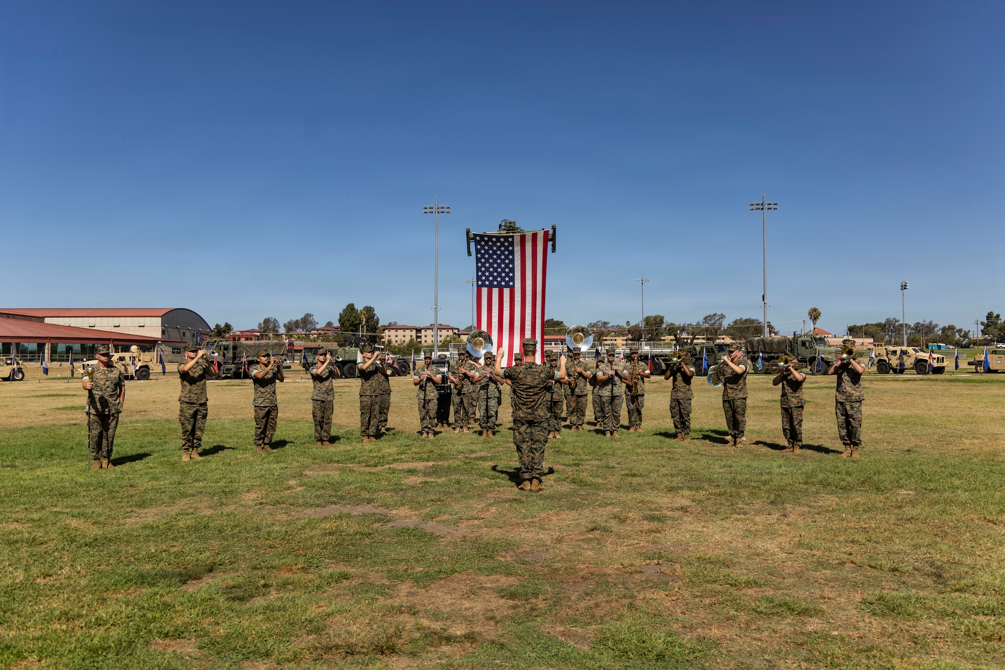 U.S. Marines with the 1st Marine Division Band play music during a change of command ceremony for Combat Logistics Regiment 1, 1st Marine Logistics Group on Marine Corps Base Camp Pendleton, California, July 23, 2026.