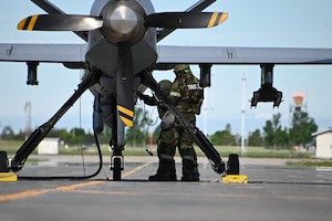 Hooligan maintainers prepare for launch in a simulated contested environment.