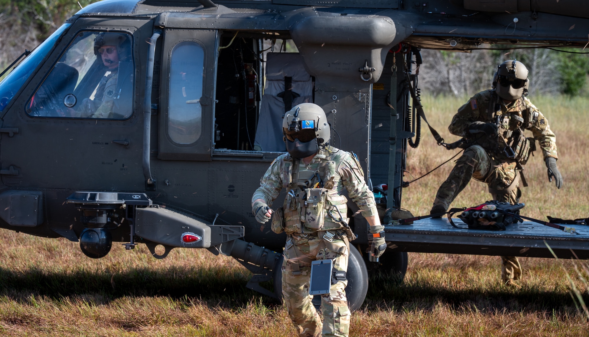 Soldier leaving helicopter