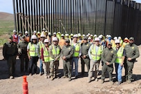 The U.S. Army Corps of Engineers South Pacific Border Task Force installs the final border barrier panel at the National Defense Area One, or NDA-1, project site July 17 near Antelope Wells, New Mexico. The NDA-1 project consists of installation of up to six miles of new permanent border barrier with access gates, patrol roadways and access improvements. USACE is installing border barriers along the southern border of the U.S. at the direction of the U.S. Army by the Secretary of War, in response to the presidential national emergency declaration dated Jan. 20, 2025, authorizing the use of Section 2808 of Title 10, U.S. Code. (No one in this image crossed the international border)