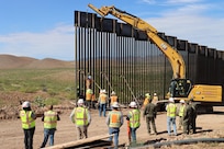 The U.S. Army Corps of Engineers South Pacific Border Task Force installs the final border barrier panel at the National Defense Area One, or NDA-1, project site July 17 near Antelope Wells, New Mexico. The NDA-1 project consists of installation of up to six miles of new permanent border barrier with access gates, patrol roadways and access improvements. USACE is installing border barriers along the southern border of the U.S. at the direction of the U.S. Army by the Secretary of War, in response to the presidential national emergency declaration dated Jan. 20, 2025, authorizing the use of Section 2808 of Title 10, U.S. Code. (No one in this image crossed the international border)