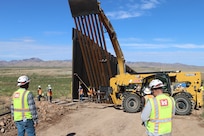 The U.S. Army Corps of Engineers South Pacific Border Task Force installs the final border barrier panel at the National Defense Area One, or NDA-1, project site July 17 near Antelope Wells, New Mexico. The NDA-1 project consists of installation of up to six miles of new permanent border barrier with access gates, patrol roadways and access improvements. USACE is installing border barriers along the southern border of the U.S. at the direction of the U.S. Army by the Secretary of War, in response to the presidential national emergency declaration dated Jan. 20, 2025, authorizing the use of Section 2808 of Title 10, U.S. Code. (No one in this image crossed the international border)
