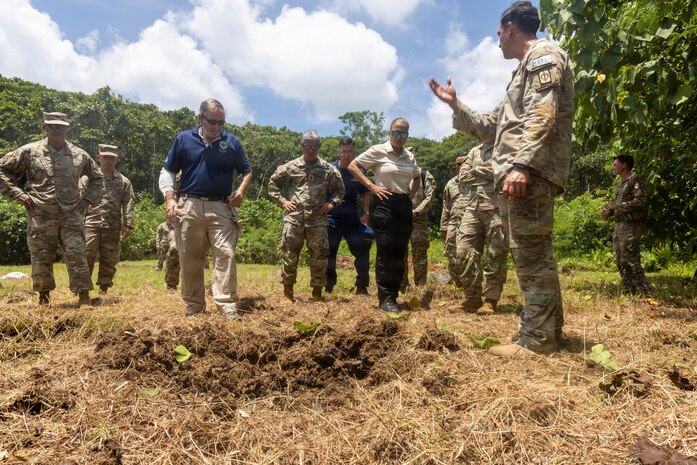 Jonathon Guthrie, left, global director for operations at Norwegian People’s Aid; U.S. Army Maj. Gen. Lance Okamura, middle, deputy commanding general for U.S. Army Pacific (USARPAC) Homeland Affairs; Jennifer Anson, right, national security coordinator for the Republic of Palau; and U.S. Soldiers assigned to the 74th Explosive Ordnance Disposal Company (EOD), 303rd EOD Battalion, 8th Military Police Brigade, 8th Theater Sustainment Command, check the detonation site after the disposal of unexploded World War II-era white phosphorus munition in Koror, Palau, Aug. 2, 2026.