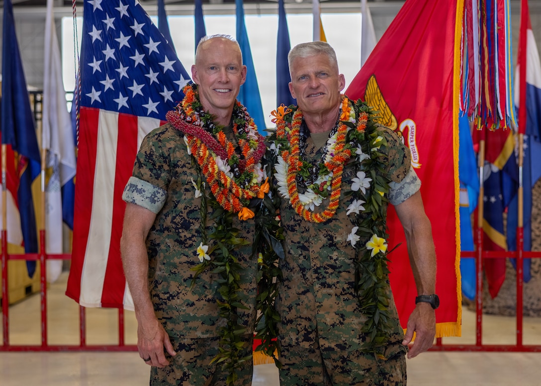 U.S. Marine Corps Lt. Gen. Roger B. Turner, right, the incoming commander for U.S. Marine Corps Forces, Pacific, and Lt. Gen. James F. Glynn, the outgoing commander for MARFORPAC, pose for a photo after the MARFORPAC change of command ceremony at Marine Corps Base Hawaii, Aug. 11, 2026.  Representing two-thirds of the Marine Corps’ operating forces, MARFORPAC serves as the Nation’s primary expeditionary force-in-readiness across the U.S. Pacific Command area of responsibility, the largest geographical combatant command in the Department of Defense, where Pacific Marines operate alongside joint forces and international partners to preserve a free and open Pacific. (U.S. Marine Corps photo by Lance Cpl. Chloe Zimmerer)