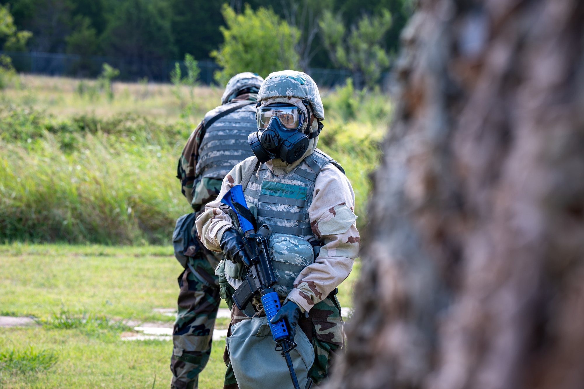Airman protects their battle buddy
