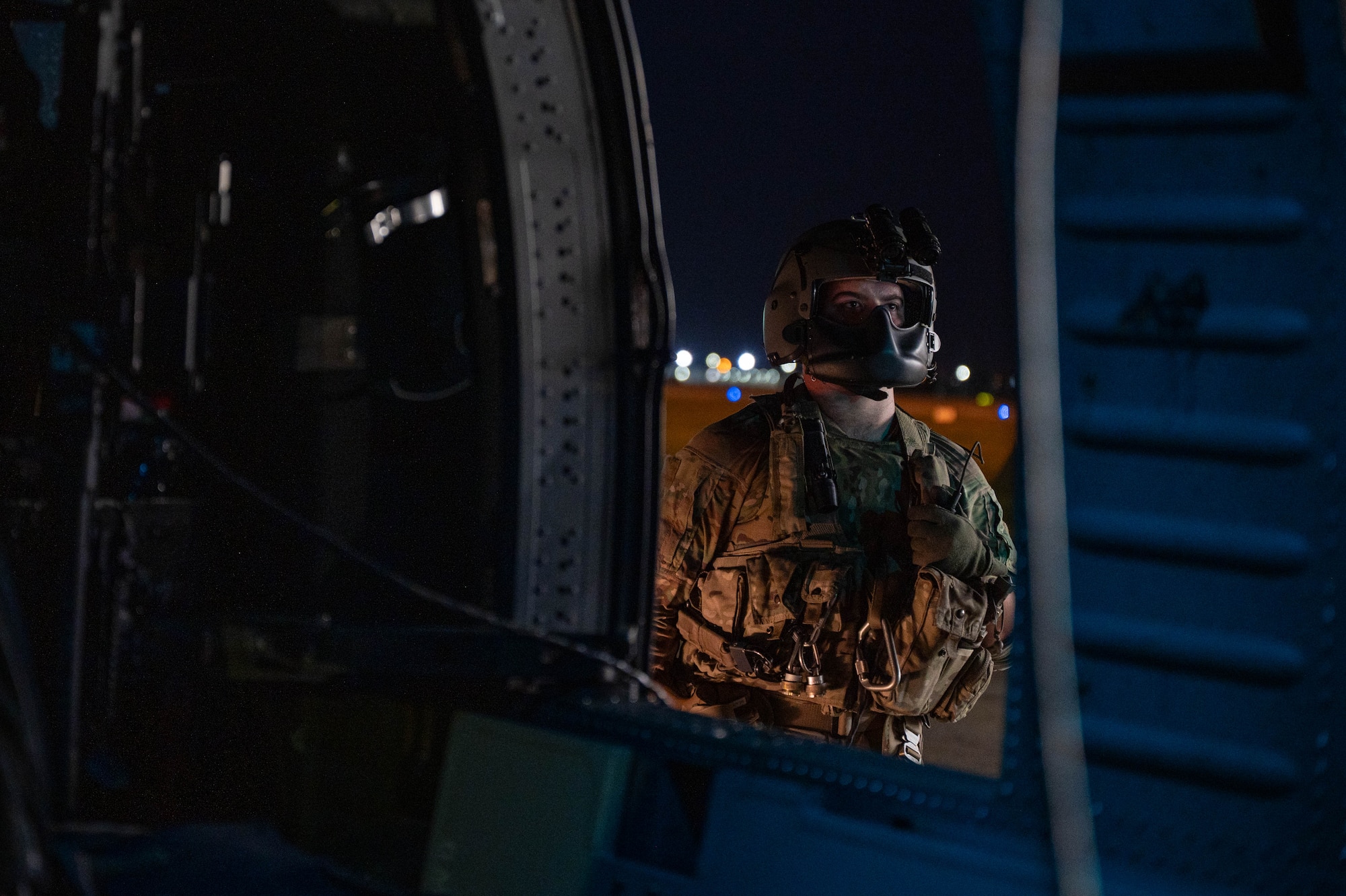U.S. Army Spc. Matthew Warner, Alpha Company, 3rd Assault Helicopter Battalion, 1st Aviation Combat Brigade crew chief, conducts pre-flight checks on a UH-60 Black Hawk before routine night flight operations at Incirlik Air Base, Türkiye, July 31, 2026.  Routine flight operations bolster mission preparedness for rapid air movement, supporting the 39th Air Base Wing’s role in enabling U.S. and NATO contingency operations.