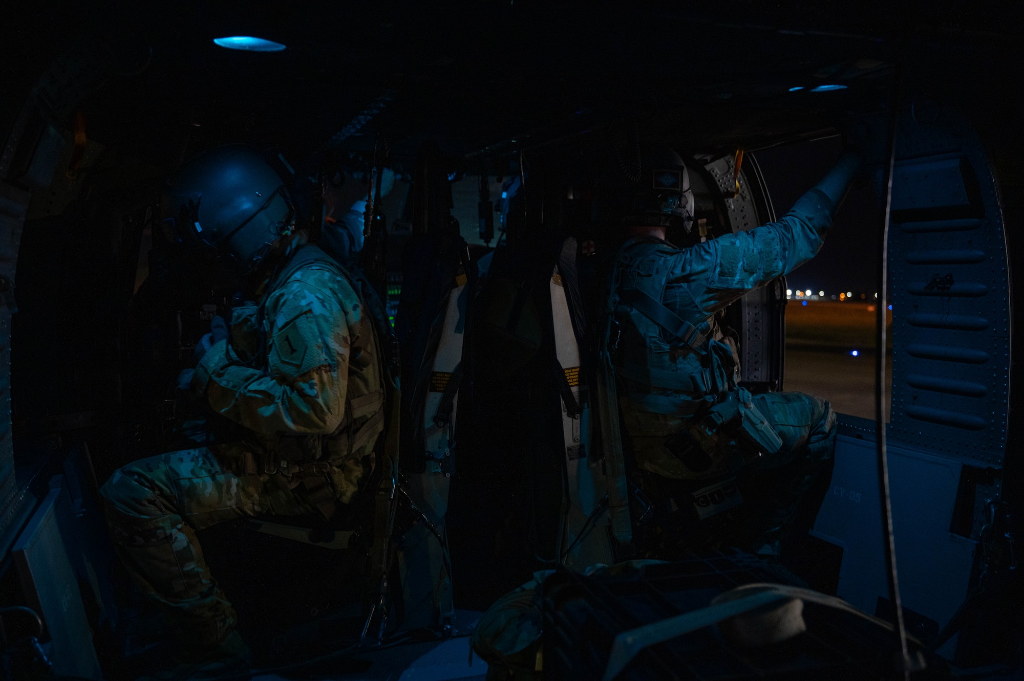 U.S. Army Sgt. Tyler Thompson, right, and Spc. Matthew Warner, Alpha Company, 3rd Assault Helicopter Battalion, 1st Aviation Combat Brigade crew chiefs, prepare for routine night flight operations at Incirlik Air Base, Türkiye, July 31, 2026. Routine flight operations help strengthen readiness and reinforce regional deterrence by ensuring U.S. and Allied forces can rapidly respond to emerging threats.