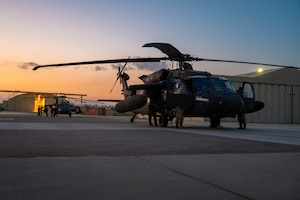 U.S. Army soldiers assigned to Alpha Company, 3rd Assault Helicopter Battalion, 1st Aviation Combat Brigade prepare two UH-60 Black Hawks for routine night flight operations at Incirlik Air Base, Türkiye, July 31, 2026. Routine flight operations help strengthen readiness and reinforce regional deterrence by ensuring U.S. and Allied forces can rapidly respond to emerging threats.
