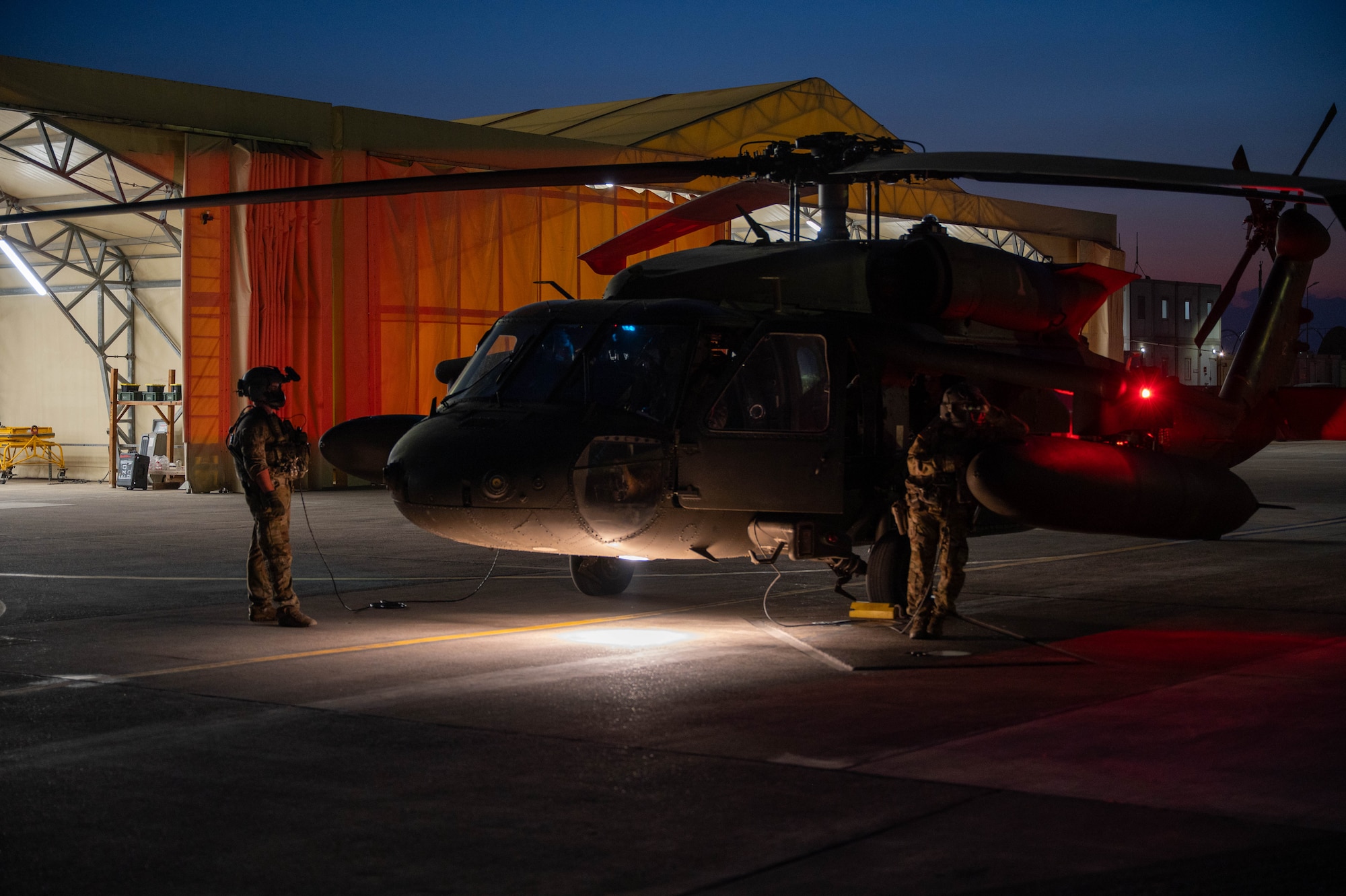 U.S. Army soldiers assigned to Alpha Company, 3rd Assault Helicopter Battalion, 1st Aviation Combat Brigade conduct pre-flight checks on a UH-60 Black Hawk before routine night flight operations at Incirlik Air Base, Türkiye, July 31, 2026. Routine flight operations keep U.S. forces combat ready and support the 39th Air Base Wing’s role in enabling U.S. and NATO contingency operations.