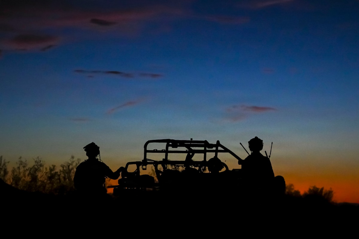 silhouette photo, sunset, razor vehicle, pararescuemen
