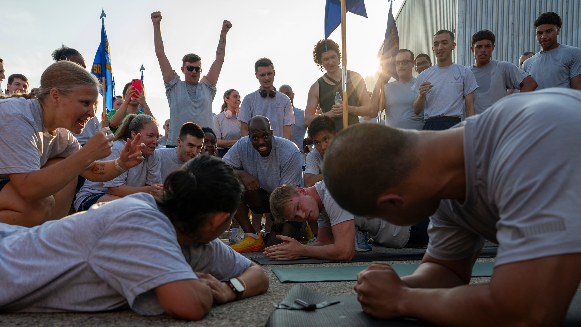 Airmen of the National Air and Space Intelligence Center compete to see who can hold the plank position.