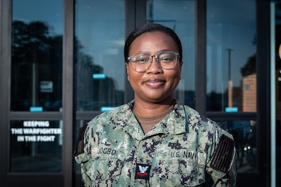 Hospital Corpsman 2nd Class Emmanuella Gbogbo serves as a radiology technologist and the leading petty officer of Navy Medicine Readiness and Training Command Cherry Point’s radiology department.  
A native of Ghana, West Africa, Gbogbo leads a team whose work provides rapid, accurate imaging to assist in the diagnosis and treatment of service members’ injuries to return them to full duty status as quickly as possible.